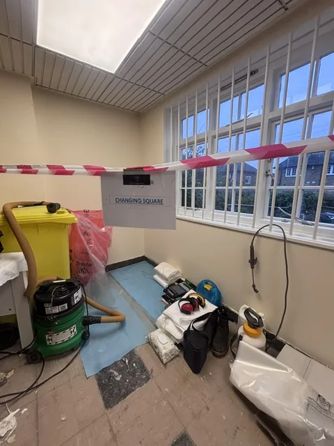 Asbestos floor tile and bitumen removal in Chingford